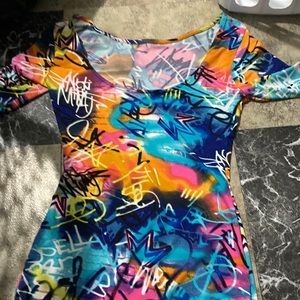 Colorful designed body con dress. Stretchy material, size M